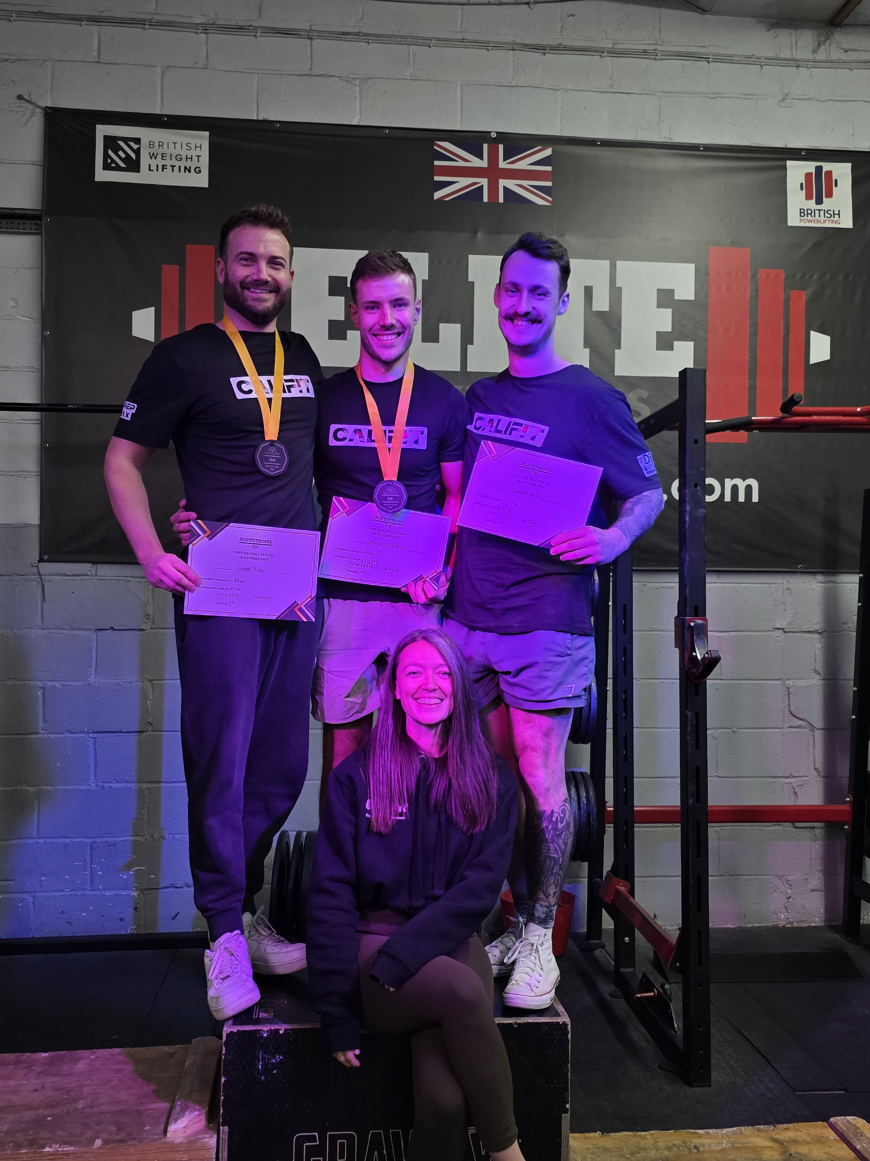 Joe, Mike, Stew, and Emily showing their success at the Bodystrong Competition